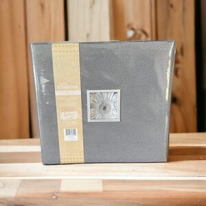 New. Tapestry 12 x 12 scrapbook with extra filler pages.